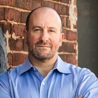 Portrait of Tom Kamber